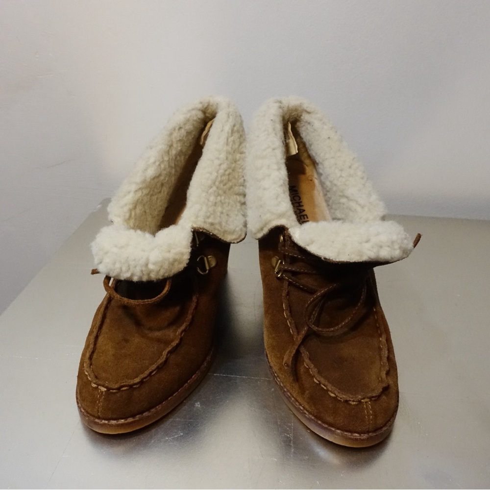 Micheal Kors leather moccasin heeled boots